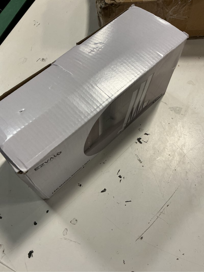 Condition photo showing New/Like New for ezvalo 6-pack under cabinet lighting with charging station, 2000mah rechargeable wireless motion sensor lights, 3 color temps, dimmable, timer, magnetic, with remote control for kitchen, closet, stair 6pack with station