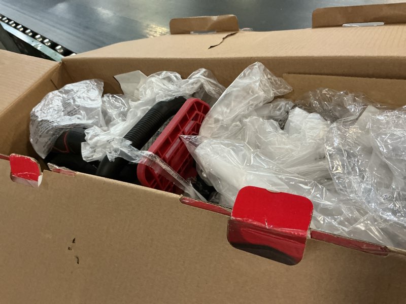 Condition photo showing As Is for hyper tough 12" 20v brushless cordless chainsaw with 20v max 4.0ah battery and charging cable