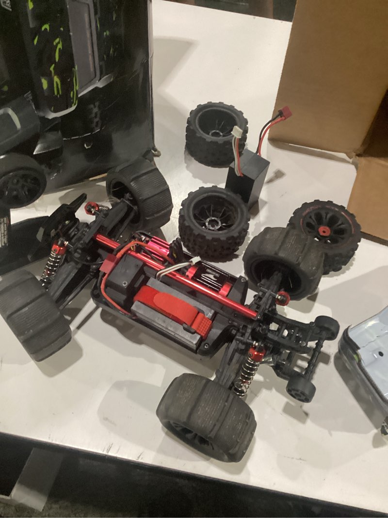 Condition photo showing Good Condition for 1/14 brushless rc cars for adults fast 50+ mph, rc trucks 4x4 offroad waterproof, electric powered high speed remote control car, fast extreme all terrain rc truggy with 3s battery for snow sand green 1:14