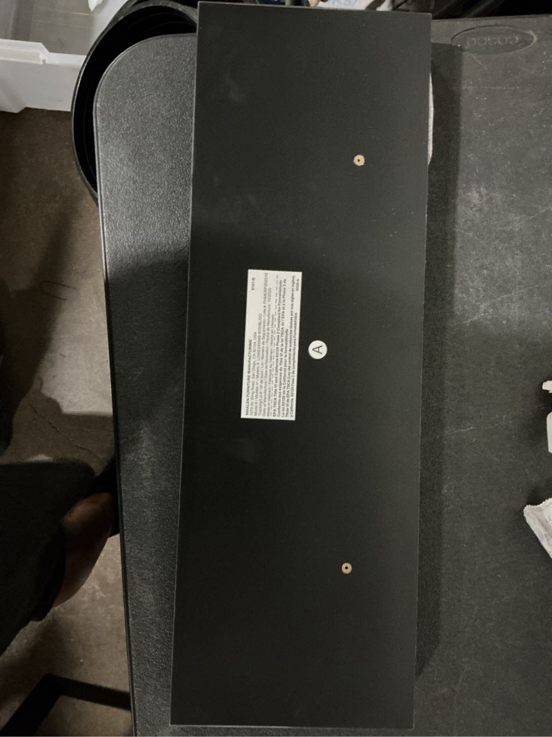 Condition photo showing As Is for allen + roth 8-in d x 24-in l black composite wood rectangular floating shelf