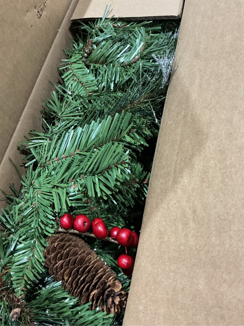 Condition photo showing Good Condition for national tree company 9 ft pre-lit crestwood spruce artificial christmas garland, christmas decoration with glitter, pinecones, red berries, 50 clear lights, 180 tips, green plug in tree