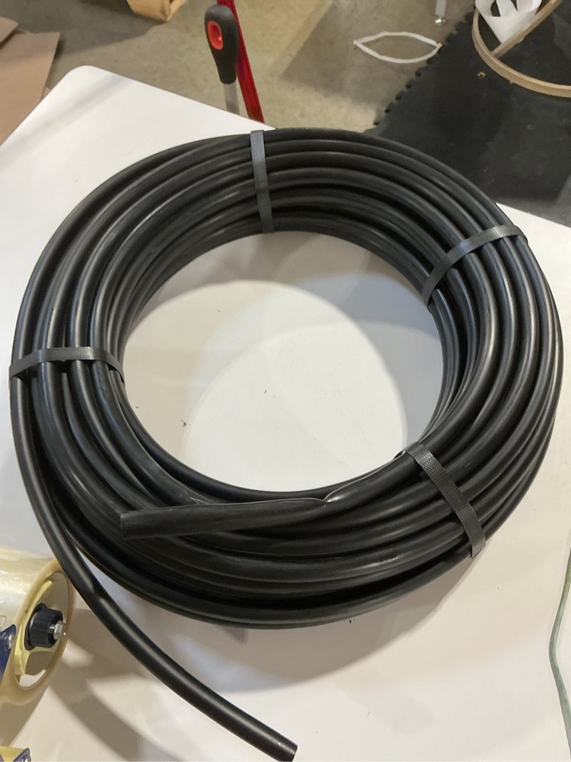 Condition photo showing Good Condition for raindrip 052010p 1/2 in. drip irrigation supply tubing, 100 ft., for emitters, irrigation parts, and drip systems,black polythyrene 100 feet hose black polyethylene