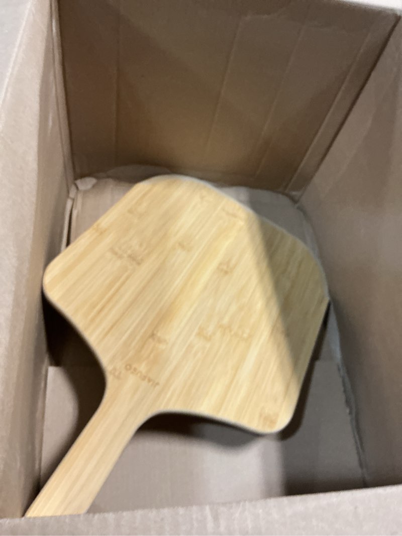 Condition photo showing As Is for Pizza Peel 14 Inch, Large Bamboo Pizza Paddle Spatula - Wooden Serving Board, Oven Accessory for Baking Homemade, Wood Cutting Board for Cheese Bread Fruit Vegetables 23" L × 14" W × 0.47" Th