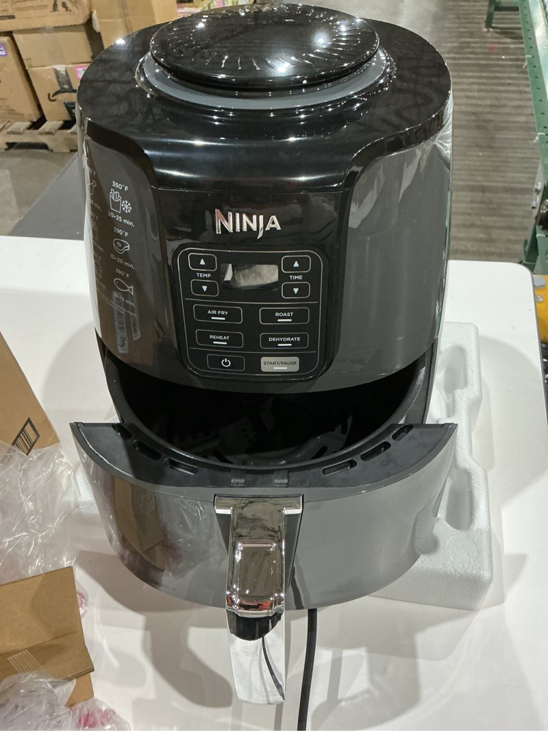 Condition photo showing Good Condition for ninja air fryer | 4 qt capacity | 4-in-1 roast, crisp, roast, reheats, & dehydrates | dishwasher safe parts | 105°f-400°f | includes 20 easy & healthy recipes | 1550 watt | grey | af101