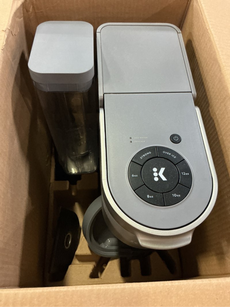Condition photo showing As Is for keurig k-supreme single serve k-cup pod coffee maker, multistream technology, 4 brew sizes, 66oz dual-position removable reservoir, gray gray coffee maker