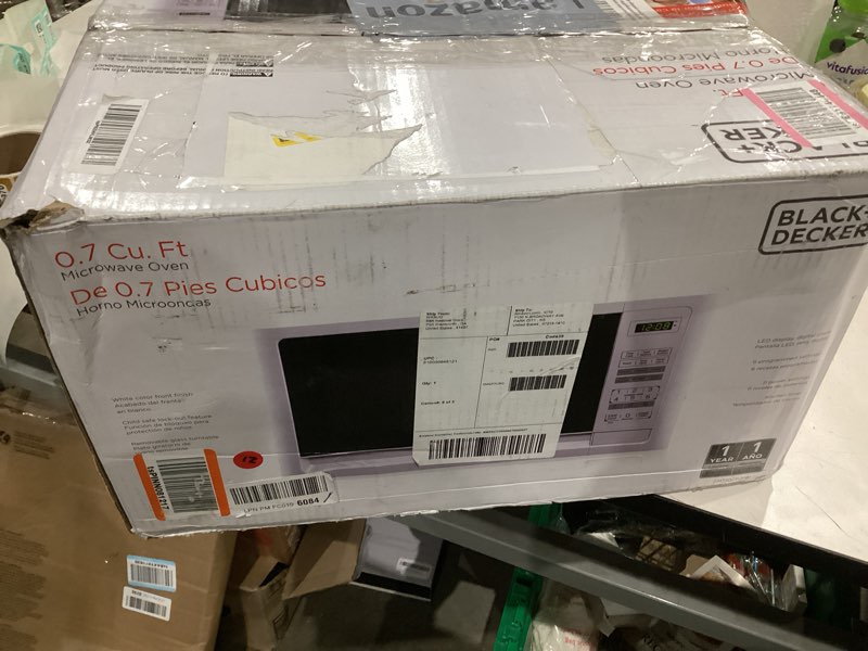 Condition photo showing As Is for BLACK+DECKER Compact Countertop Microwave Oven 0.7 Cu. Ft. 700-Watts with LED Lighting, Child Lock, White White 0.7 Cu. Ft.