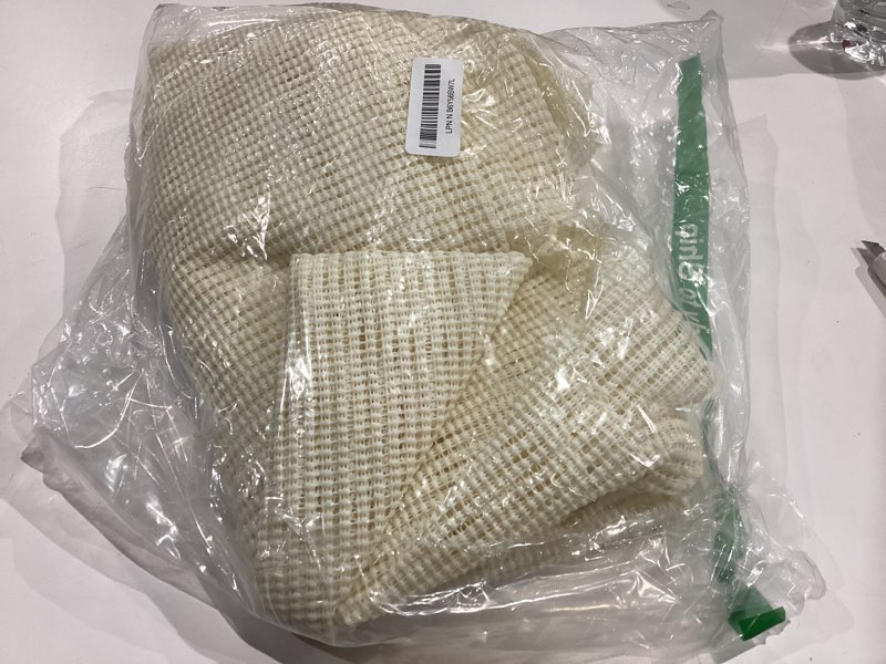 Condition photo showing Good Condition for non-slip rug pad gripper 8x10 feet, anti skid mat for under area rugs, keeps rugs in position and safe, thick cushioned carpet pad for hardwood floors protection