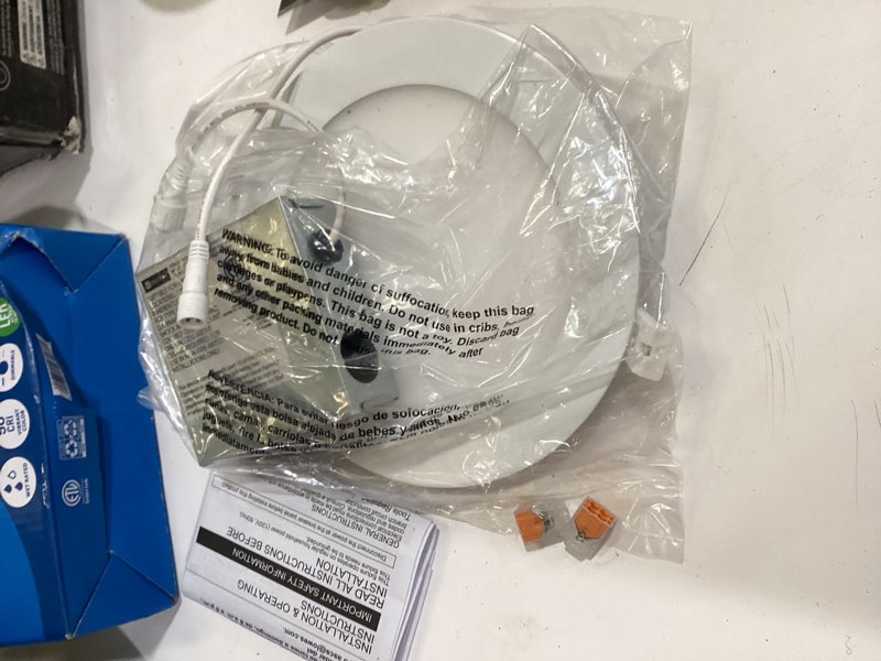 Condition photo showing As Is for utilitech white 6-in 850 -lumens switchable white round dimmable led canless wet rated recessed downlight