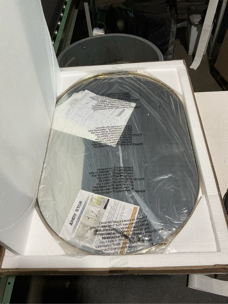 Condition photo showing New/Like New for andy star 26x38 inch gold oval mirror, oval brass mirror pill shaped stainless steel 1’’ deep metal frame wall mounted vertically & horizontally ideal for limited space gold 38"l x 26"w