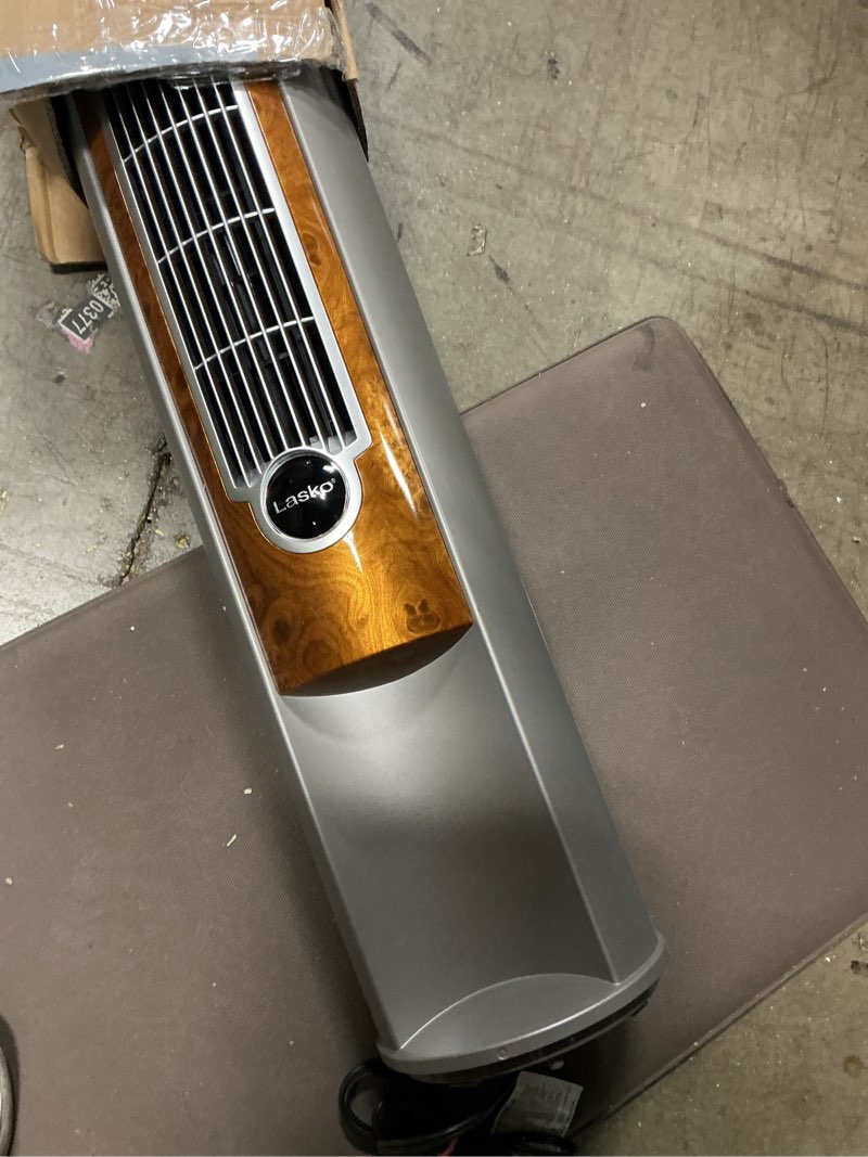 Condition photo showing Good Condition for lasko oscillating tower fan with remote, quiet floor fans for bedroom, 42", woodgrain and grey, t42954