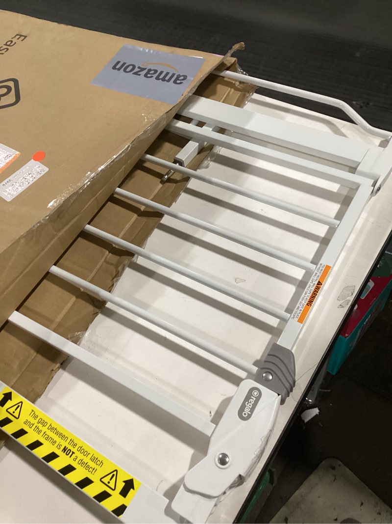 Condition photo showing As Is for Safety 1st Easy Install Walk Thru Baby Gate for Doorway With Door, Dog Gates, Fits 29"-38", Easy Install 28" Tall, White 1-Pack 29" to 38" Wide x 28" Tall White