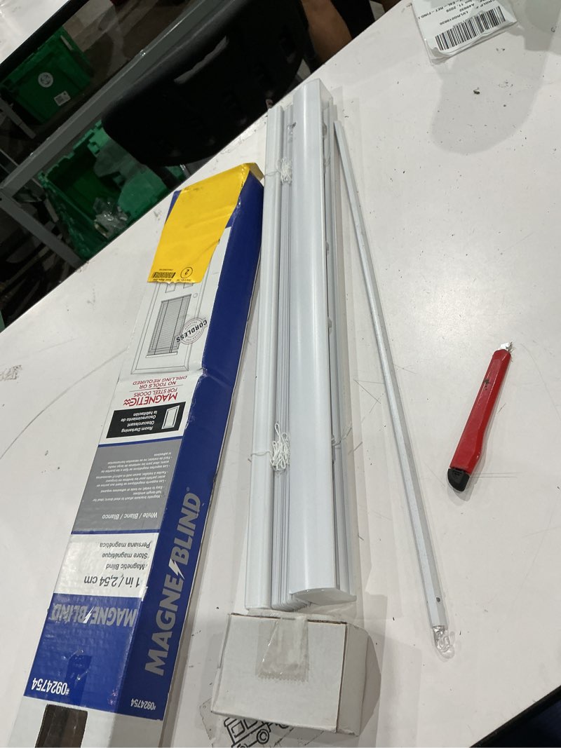 Condition photo showing As Is for magne blind 1-in slat width 25-in x 42-in cordless white vinyl room darkening half-view standard mini blinds