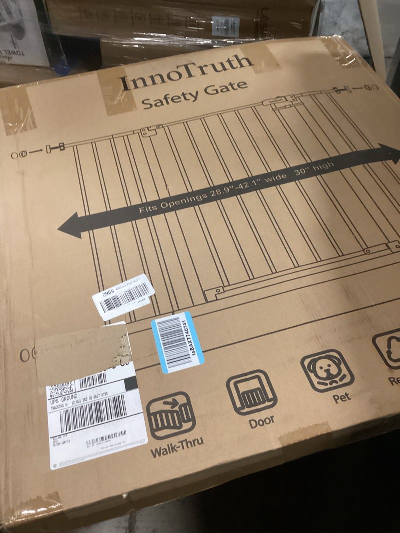 Condition photo showing New/Like New for InnoTruth 28.9-42.1" Wide Baby Gate for Stairs & Doorways, 30" Tall Pressure Mounted Dog Gates for Stairs Expandable One-Hand Open, Easy Step Walk Through Dual Lock Metal Pet Gates for Dogs, White White 28.9-42.1" W x 30" H