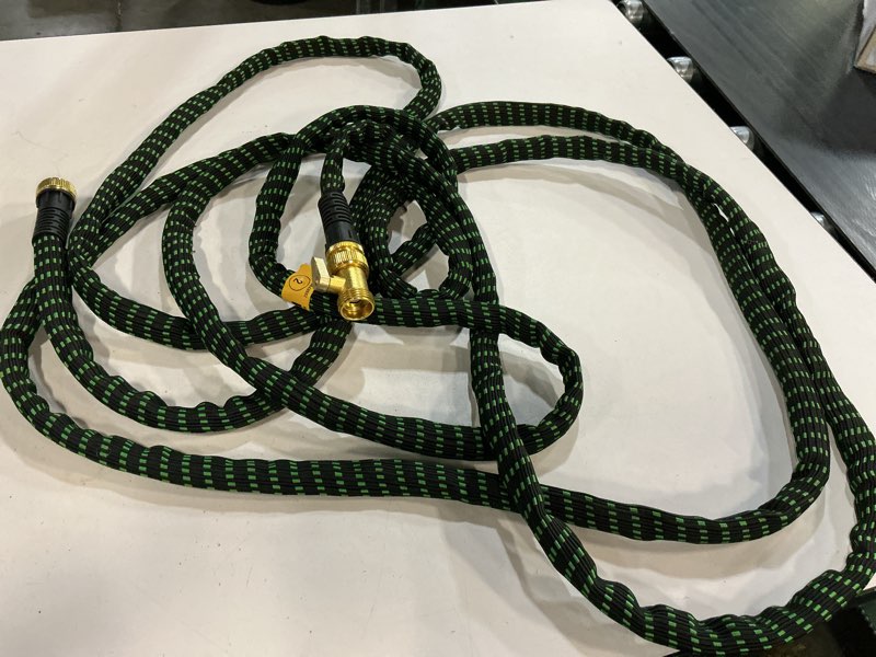 Condition photo showing As Is for flexi hose with 8 function nozzle, 25ft - lightweight expandable garden hose, no-kink flexibility, 3/4 inch solid brass fittings and double latex core - black and green