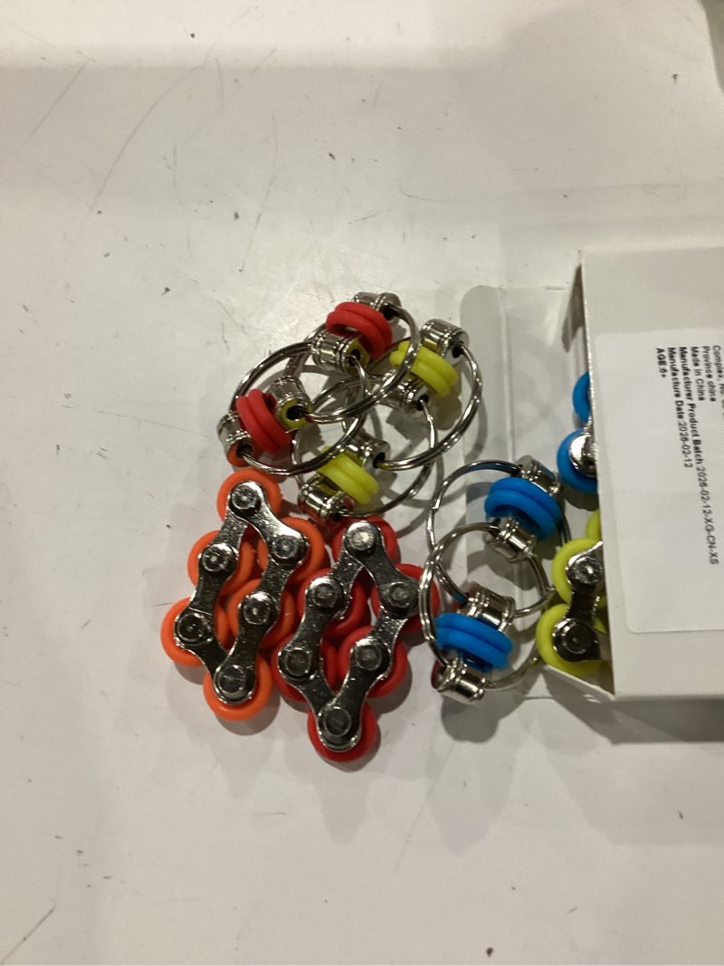 Condition photo showing Good Condition for 8 pieces fidget toys set includes 4 flippy roller chain and 4 six roller bike chain toys for adults and teenagers in learning help (red, sky blue, yellow, orange)