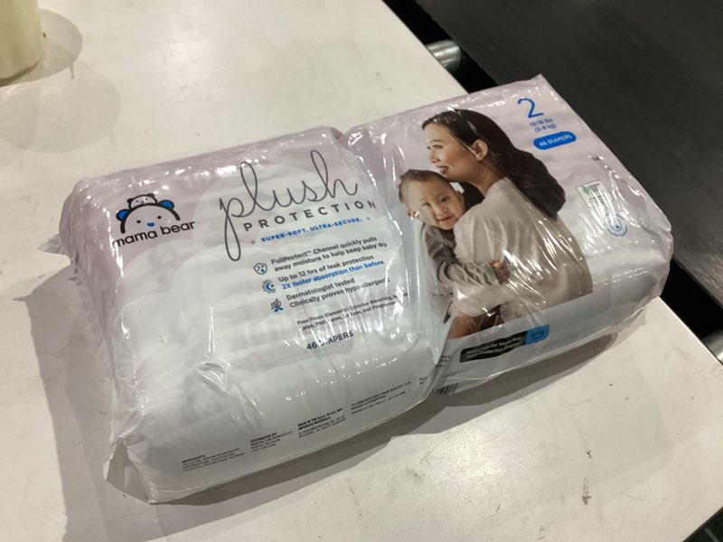 Condition photo showing New/Like New for amazon brand - mama bear plush protection size 2 diapers, ultra-soft, hypoallergenic, dermatologist tested, for babies weighing 12 to 18 pounds, assorted print, 46 count