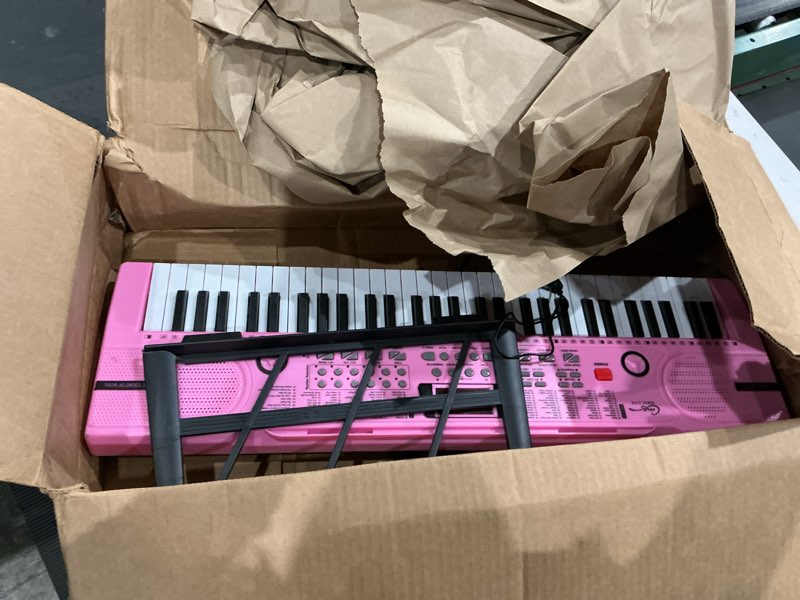 Condition photo showing As Is for piano keyboard, 61 keys beginner electronic keyboard portable digital music keyboard, early education music instrument with microphone & music sheet stand pink