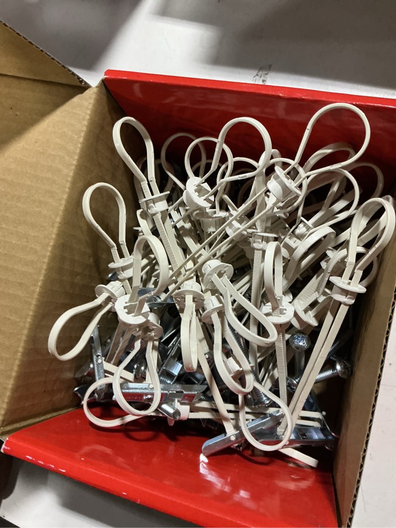 Condition photo showing As Is for 1/4" heavy duty master toggle bolt strap anchors (50 pack) w/ 50 steel threaded studs, 3/8" to 3-5/8" grip range, for 1/4"-20 fastener size - 240lb in 3/8-1/2" & 300lb in 5/8" drywall holding strength