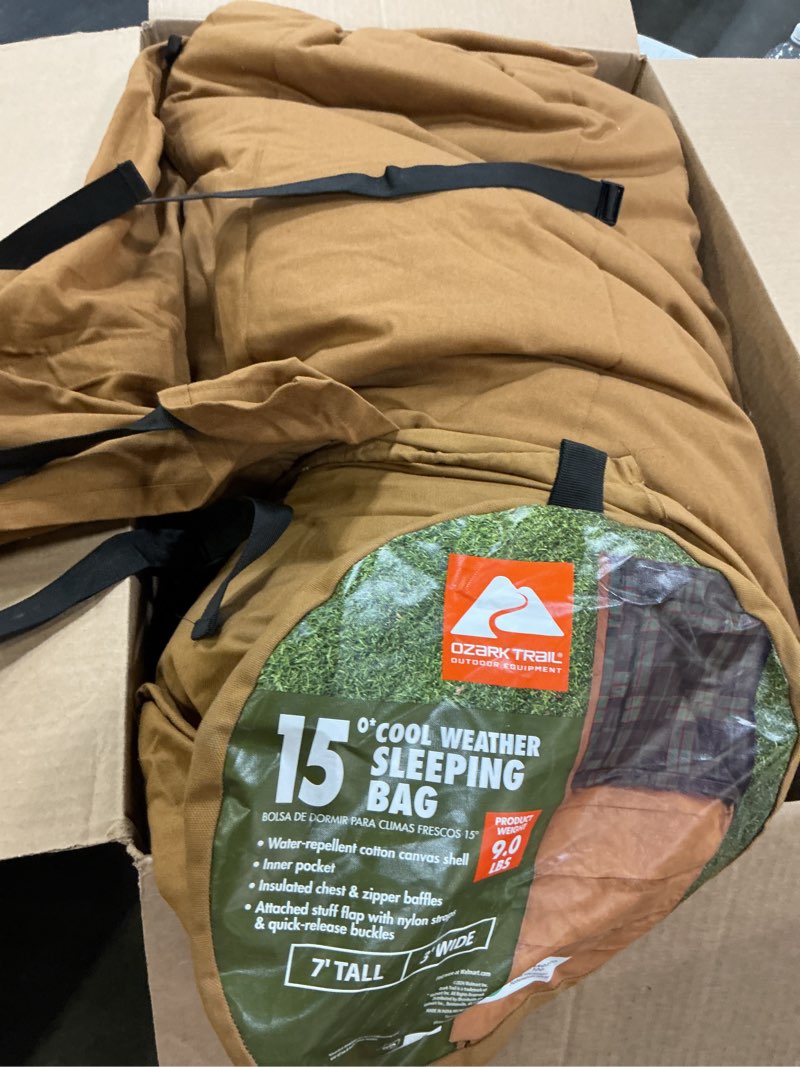 Condition photo showing As Is for ozark trail 15 degree cold weather rectangle canvas sleeping bag, 84”x36”, tan