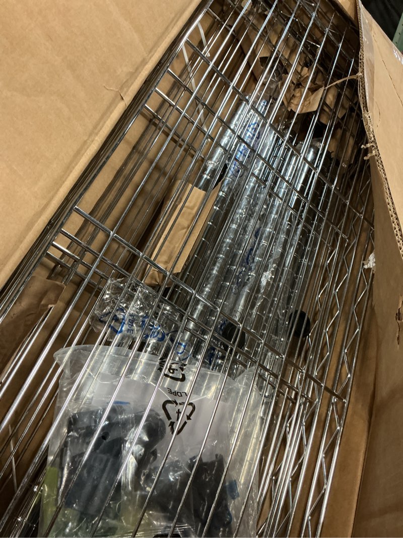 Condition photo showing Good Condition for Amazon Basics 4-Shelf Adjustable Heavy Duty Steel Wire Rack Storage Shelving Organizer for Kitchen, Garage, 36" L x 14" W x 54" H, Chrome Silver 4-Shelf Chrome