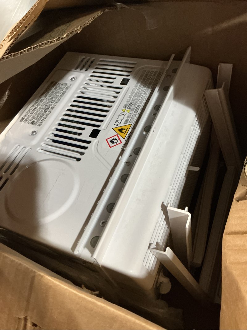 Condition photo showing As Is for amazon basics 5000-btu small window air conditioner, up to 150 sqf, window ac units with cool and fan functions, washable filter, adjustable window kit, intuitive mechanical controls, white white 5000 btu