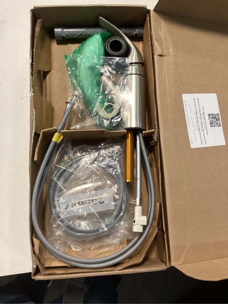 Condition photo showing As Is for moen integra spot resist stainless one-handle pullout kitchen or laundry faucet featuring power clean with optional deckplate, 67315srs 0.375 stainless