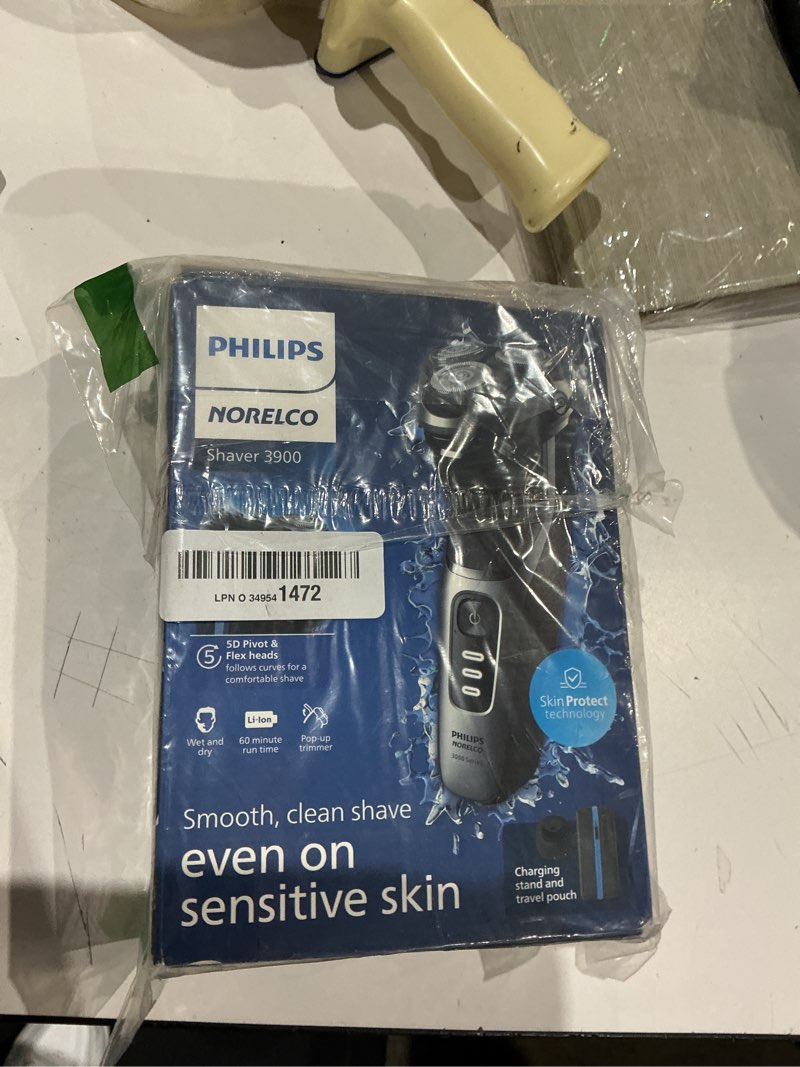 Condition photo showing As Is for philips norelco shaver 3900 series, wet and dry electric shaver, p-cap, travel pouch, charging stand, storm blue, model s3341/92 silver new shaver series 3000 + charging stand