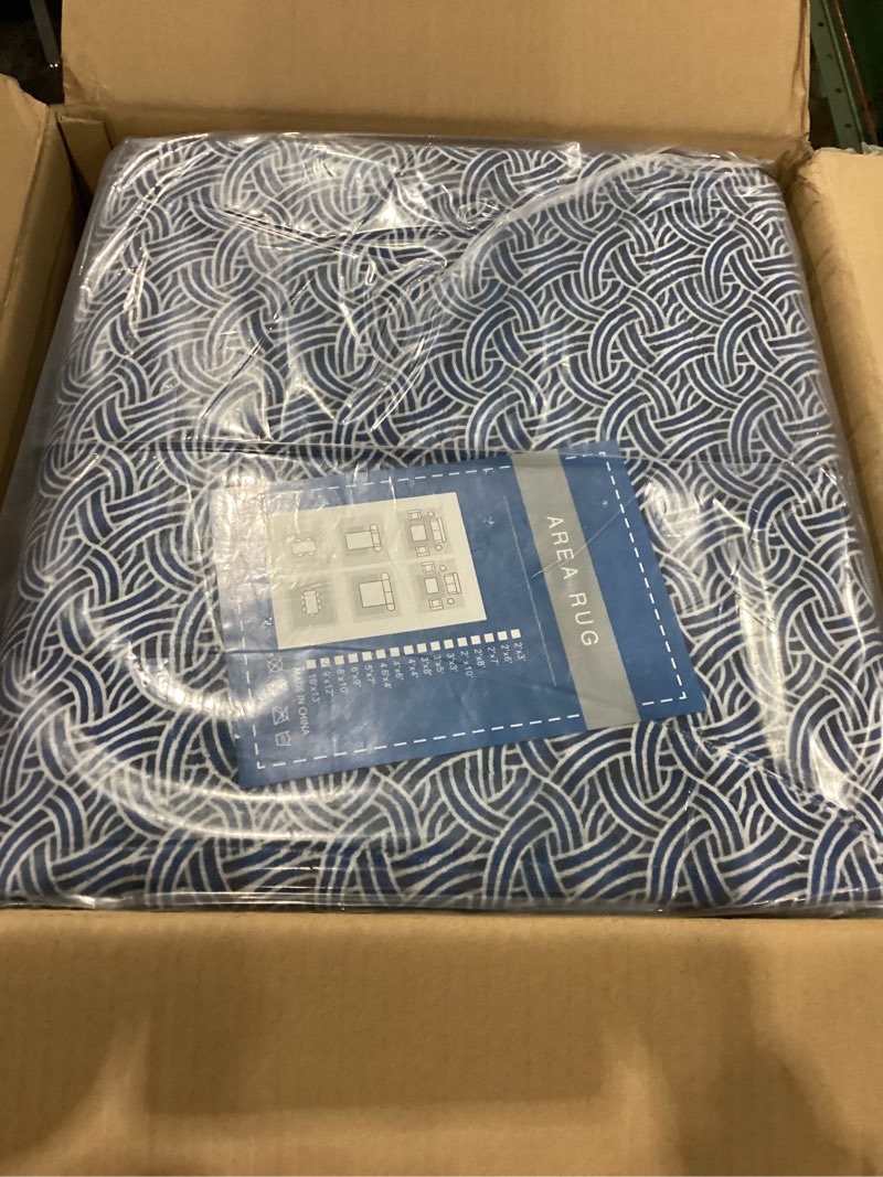 Condition photo showing New/Like New for printed area rug with braided-look texture - machine washable, non-slip indoor carpet for living room, bedroom & durable home decor white-blue 9' x 12' (rectangular)