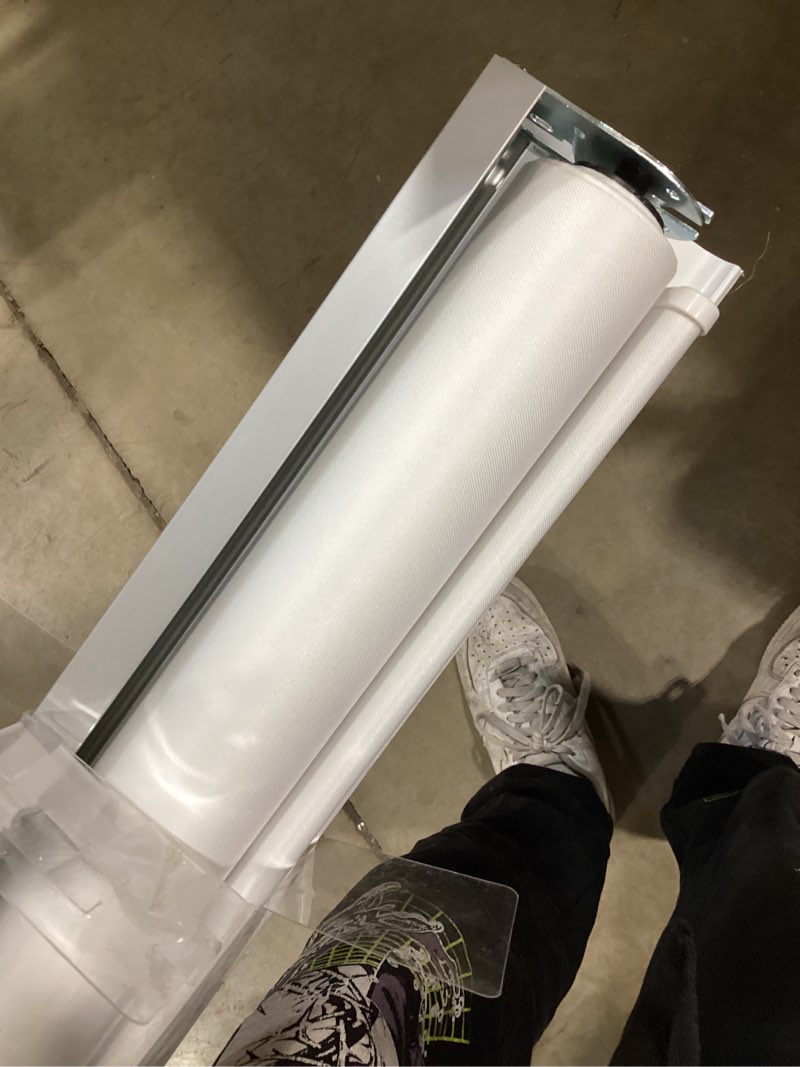 Condition photo showing As Is for allen + roth 35-in x 72-in white room darkening cordless roller shade