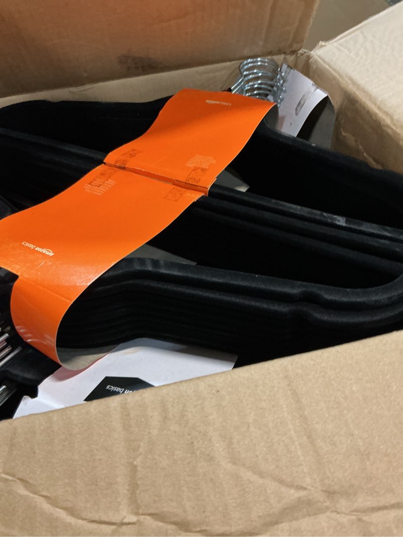 Condition photo showing Good Condition for amazon basics slim velvet, non-slip suit clothes hangers, pack of 100, black black pack of 100