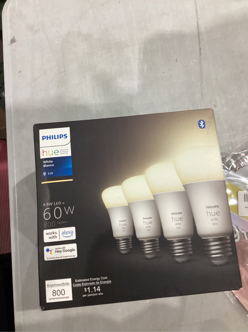 Condition photo showing item condition for Philips Hue Smart 60W A19 LED Bulb - Soft Warm White Light - 4 Pack - 800LM - E26 - Indoor - Control with Hue App - Works with Alexa, Google Assistant and Apple Homekit Original 4 Pack