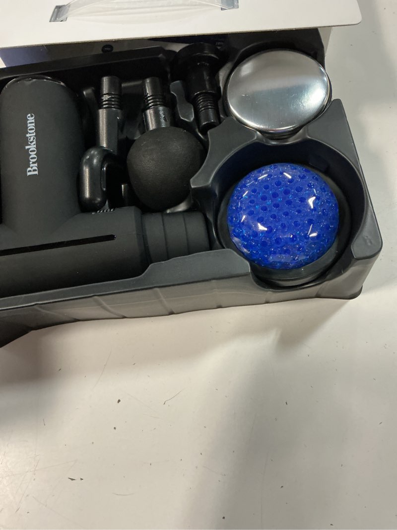 Condition photo showing As Is for brookstone cordless hot and cold percussion deep tissue massager gun, 6 intensity levels