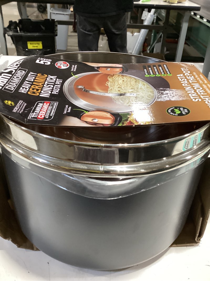 Condition photo showing New/Like New for gotham steel 5 quart stock pot multipurpose pasta pot with strainer lid & twist and lock handles, nonstick ceramic surface makes for effortless cleanup with tempered glass lid, dishwasher safe | twist and lock handles, non toxic ceramic non stick coating, for cooking soup, spaghetti, rice, dishwasher safe - copper