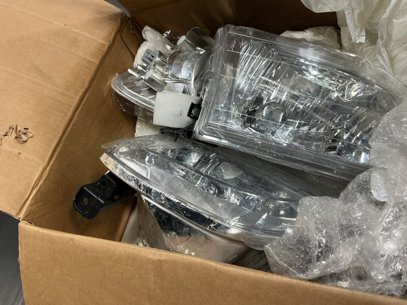 Condition photo showing Good Condition for headlight assembly with corner light compatible with toyota tundra 2000 2001 2002 2003 2004 regular | access cab, halogen headlamp pair set w/o bulbs, chrome housing clear lens yellow corner chrome headlights & parking lights