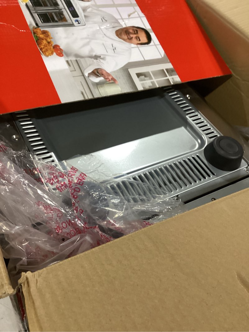 Condition photo showing As Is for Dan - Emeril Lagasse Extra Large French Door Air Fryer Toaster Oven Combo, 24 Cooking Functions and Digital Controls, 7 Accessories Included, Stainless Steel Finish, 26QT Capacity