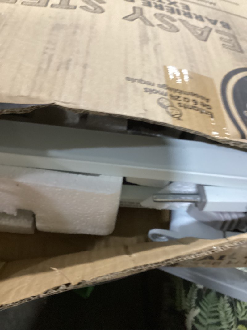 Condition photo showing As Is for regalo safety 36" extra tall baby gate for doorways & bottom of stairs, pressure mounted walk through gate for babies, toddlers & pets, tested & safe for 30 years, american designed, american owned white 29-36.5"w x 36"h