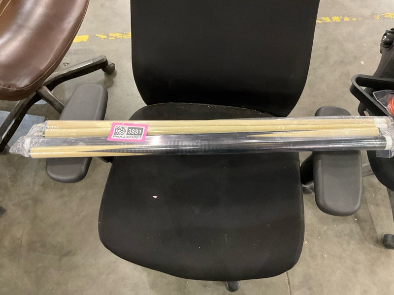 Two pool sticks 