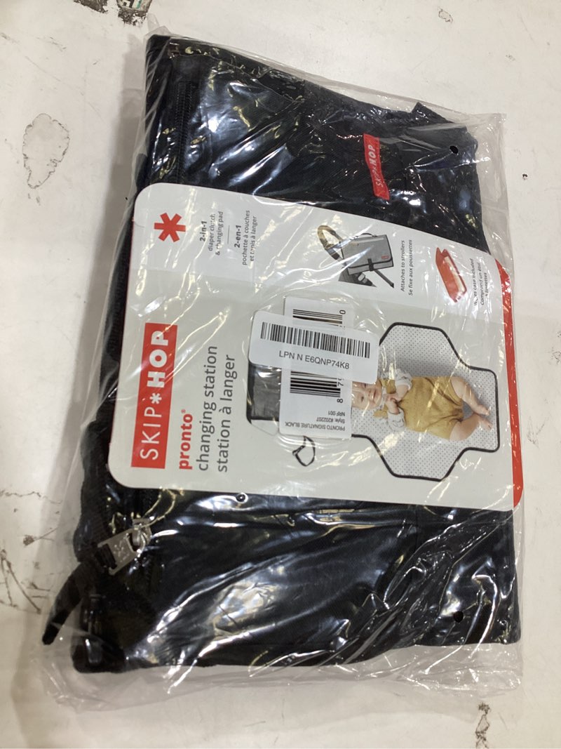 Condition photo showing New/Like New for skip hop pronto signature portable changing mat, cushioned diaper changing pad with built-in pillow black