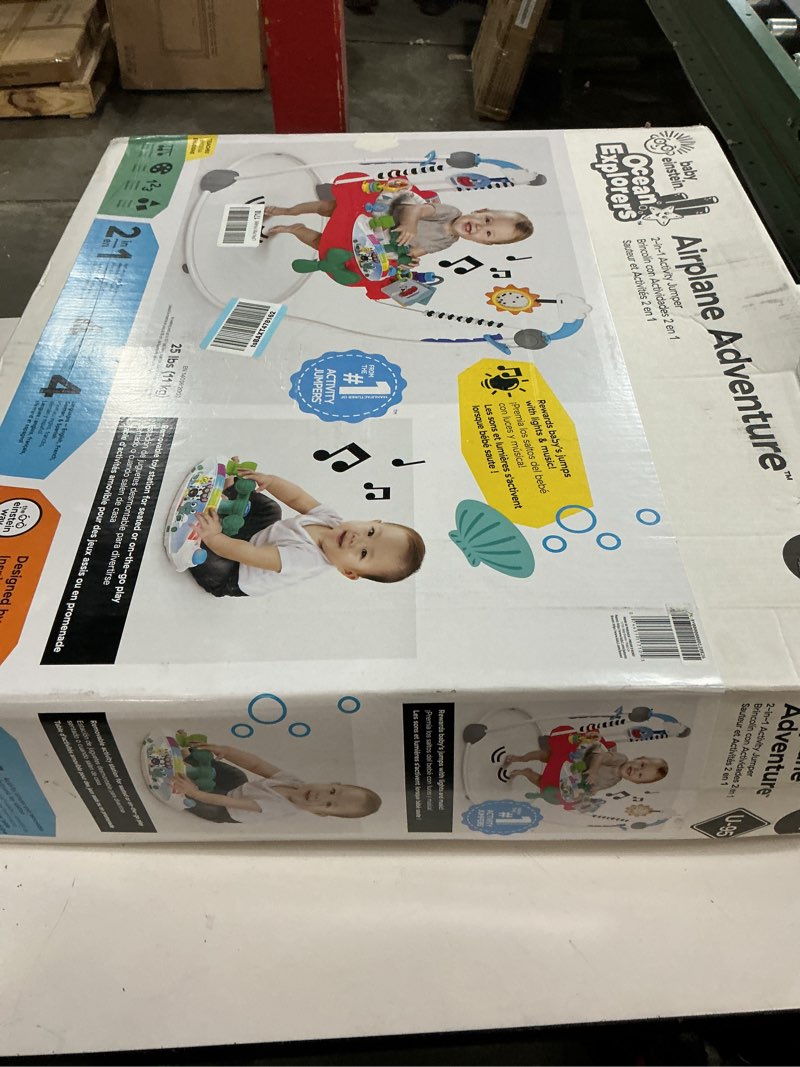 Condition photo showing New/Like New for Baby Einstein Ocean Explorers Airplane Adventure 2-in-1 Interactive Baby Jumper Activity Center with Lights Ages 6 Months +, Max Weight 25 lbs., Unisex