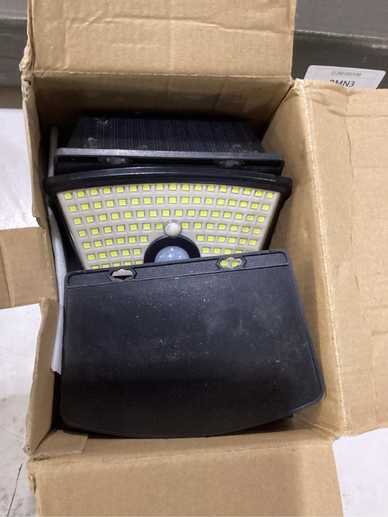 Condition photo showing As Is for aootek new solar motion sensor lights 120 leds with lights reflector,270° wide angle, ip65 waterproof, step lights for front door, yard, garage, deck (black, daylight white, 6-pack) black shell-daylight white 6 pack