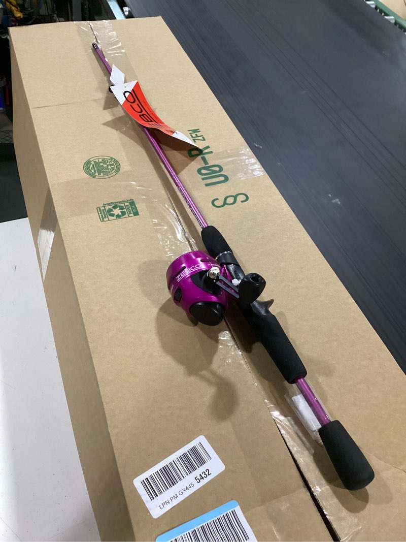 Condition photo showing New/Like New for zebco slingshot spincast reel and fishing rod combo, 2-piece fishing pole, right-hand retrieve, pre-spooled with 10-pound zebco line purple reel&fishing rod combo