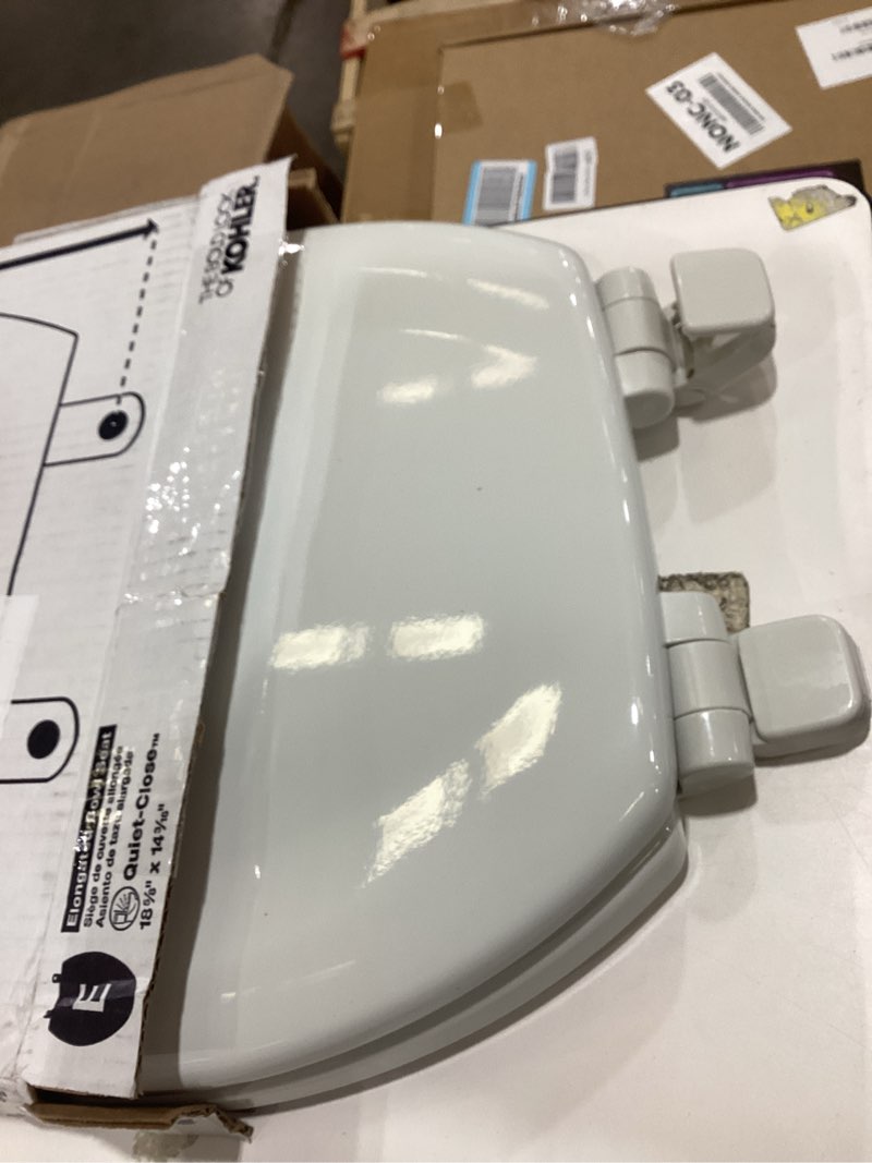 Condition photo showing As Is for kohler stonewood quiet-close, elongated toilet seat soft close, durable wood, easy installation, universal fit, home essentials, white finish, k-20466-0 white elongated double-hinge