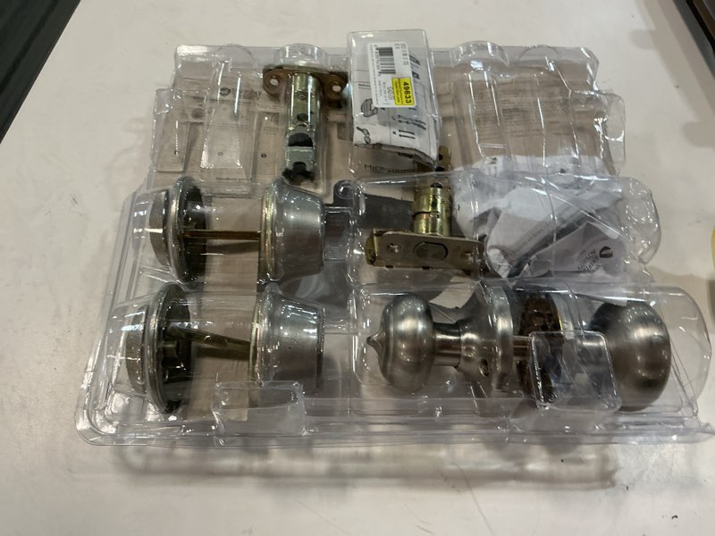 Condition photo showing Good Condition for kwikset smartkey security classic satin nickel entry knob and single cylinder deadbolt kw1 2-3/4 in.