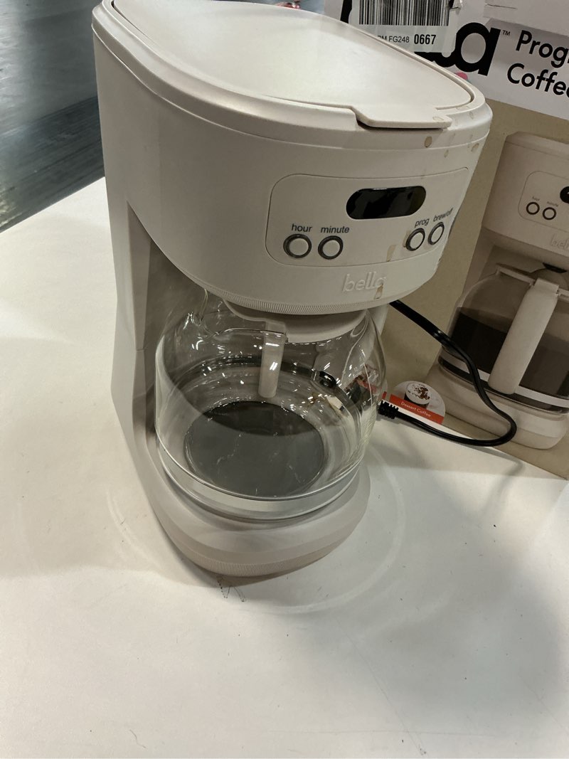 Condition photo showing As Is for BELLA 12 Cup Programmable Coffee Marker, Reusable Dishwasher Safe Accessories, Easy LCD diaply, Auto Shutoff, 900 watt, Oatmilk
