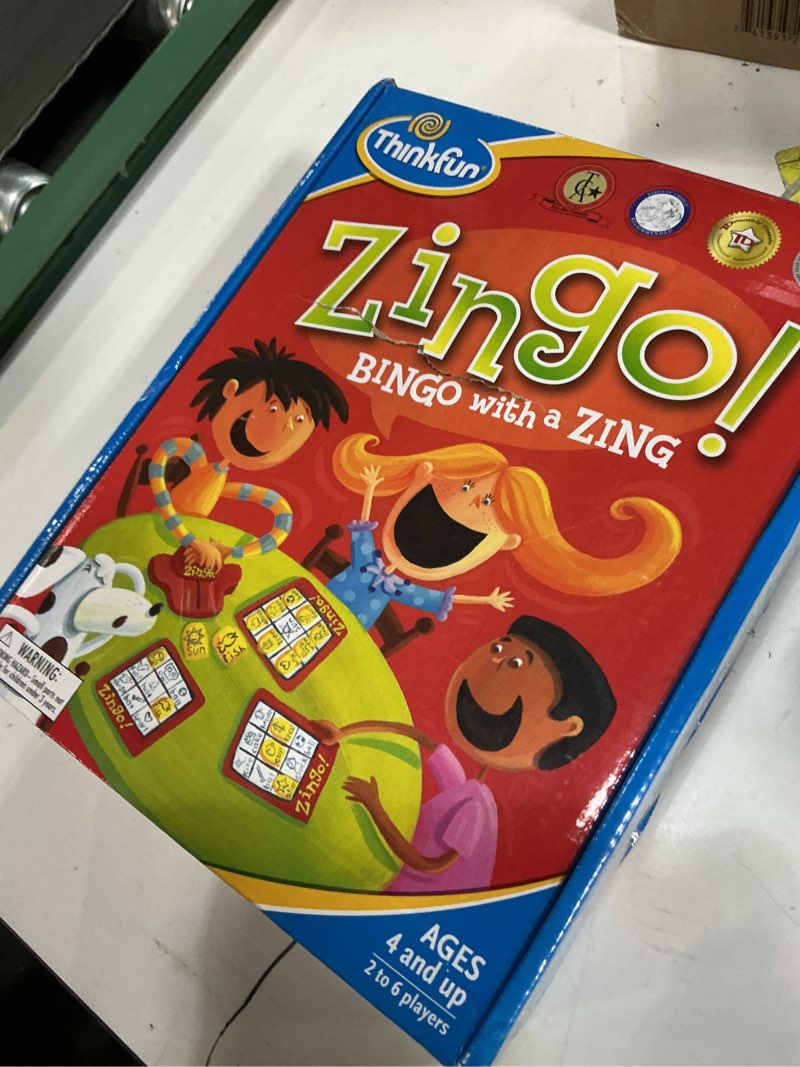 Condition photo showing Good Condition for thinkfun zingo bingo award winning preschool game for pre-readers and early readers age 4 and up - one of the most popular board games for boys and girls and their parents (97700) thinkfun zingo bingo - unique pre-reading game for kids | boosts language & matching skills | fun for classroom & home | amazon exclusive with extra zingo card