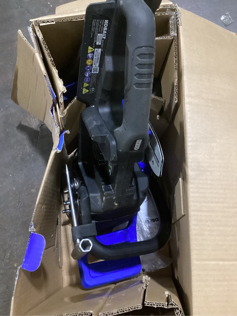 Condition photo showing As Is for (possibly missing parts & used) kobalt 48-volt 14-in battery 4 ah chainsaw battery included charger included