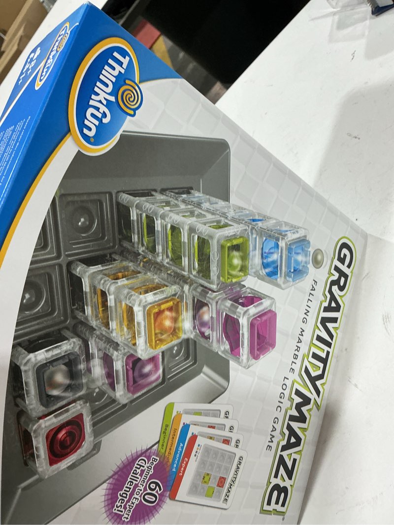 Condition photo showing New/Like New for thinkfun gravity maze - falling marble logic game - challenging stem toy for kids 8-12 - gravity marble maze - brain-building fun - educational gift - boosts critical thinking & problem solving