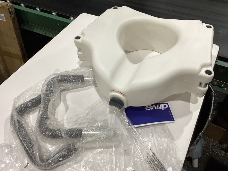 Condition photo showing New/Like New for bath safetyraised toilet seat product description: elev.toilet seat w/ remarms,rtl,1 ea