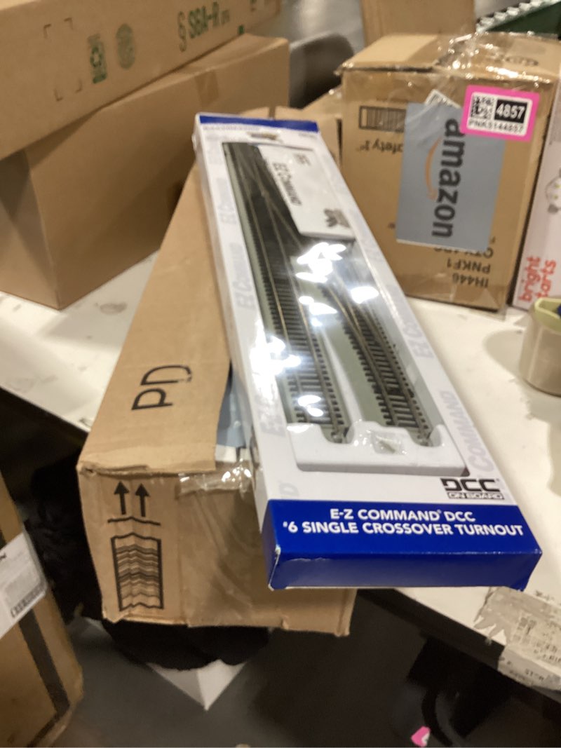 Condition photo showing New/Like New for bachmann trains - snap-fit e-z track #6 remote crossover turnout - left (1/box) - nickel silver rail with gray roadbed - ho scale