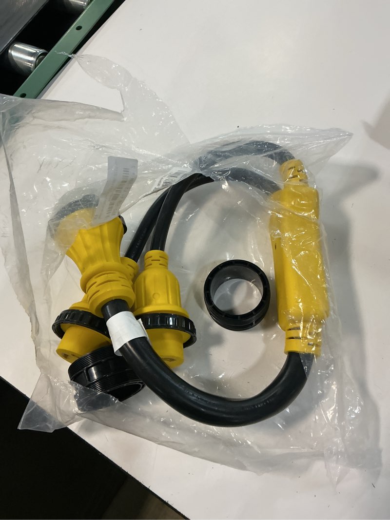 Condition photo showing As Is for marine shore power adapter, ss2-50p y splitter to (2) l5-30r, 50 amp ss2-50p male to 30 amp l5-30r female y adapter w/locking ring & collar, stw 6 awg, 3ft, etl listed
